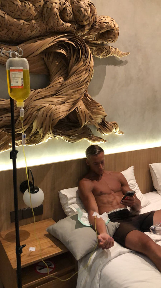 Client smiling after IV drip therapy at Ubud Bali hotel