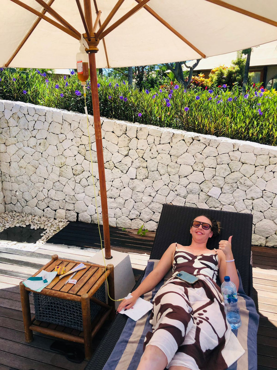 Happy guests receiving IV drip therapy at a Bali villa - Ever Well Health mobile IV service Seminyak